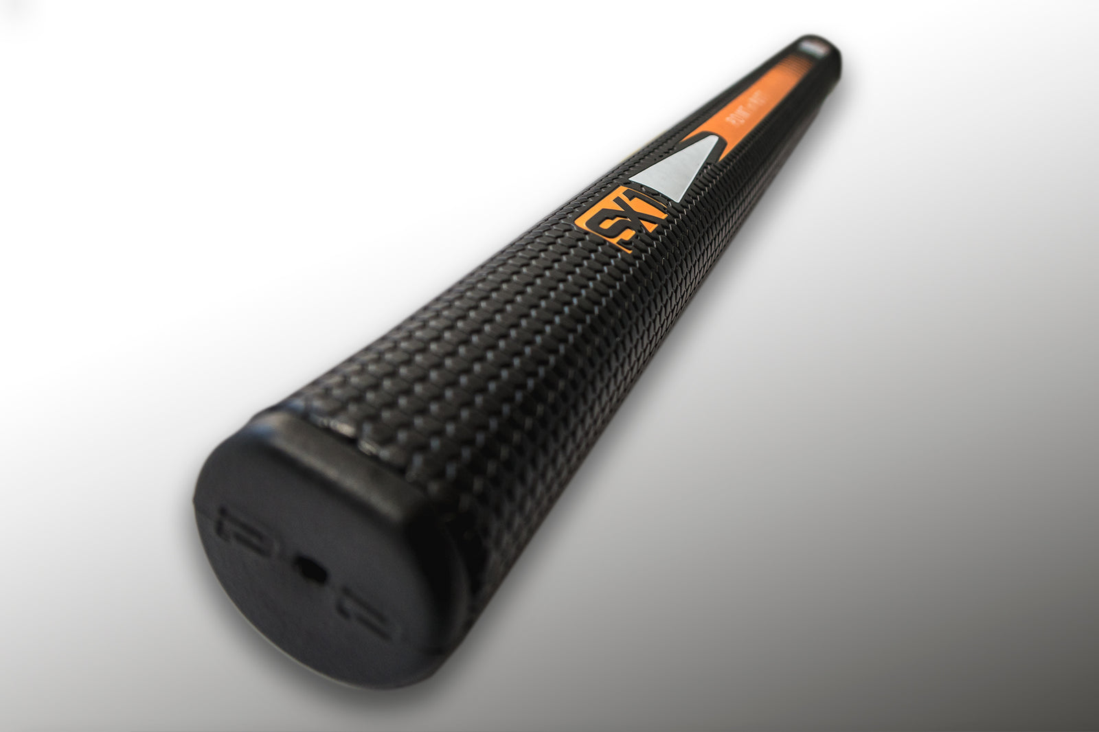 Close up of textured black BIGEzy™ Counterbalanced Putter Grip by PnP Golf showing non slip pattern and orange logo
